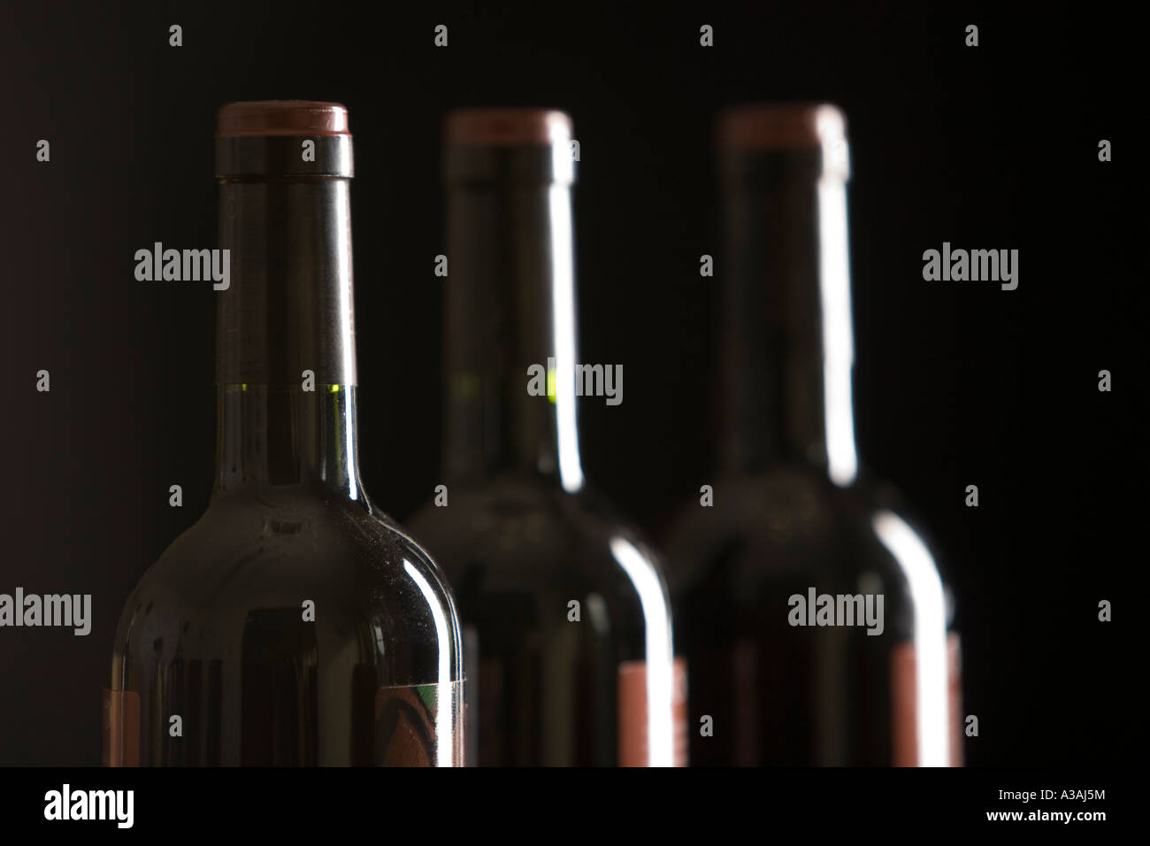 Three red wine bottles hi-res stock photography and images - Alamy