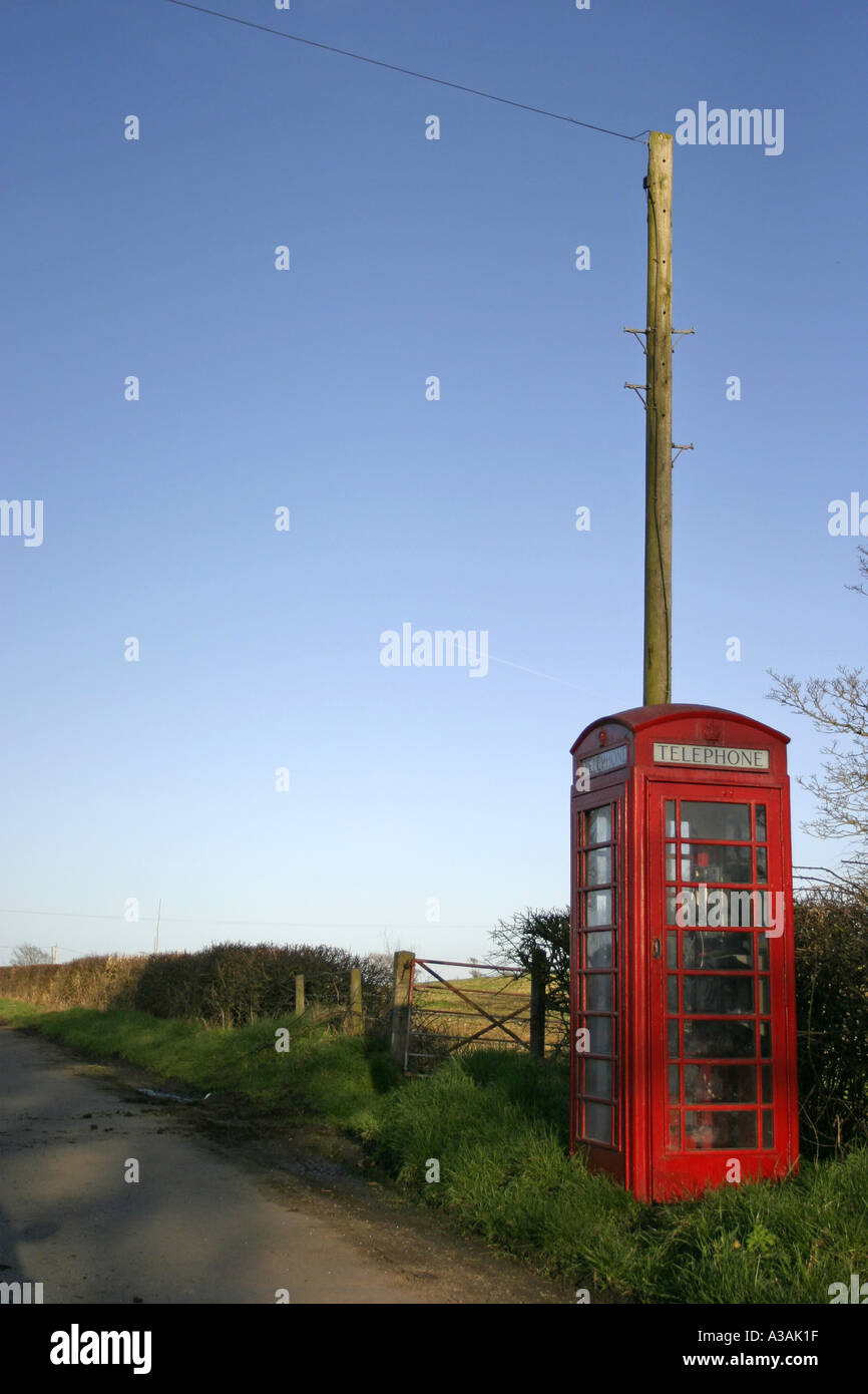 old red telephone box GPO British by lane blue sky county down