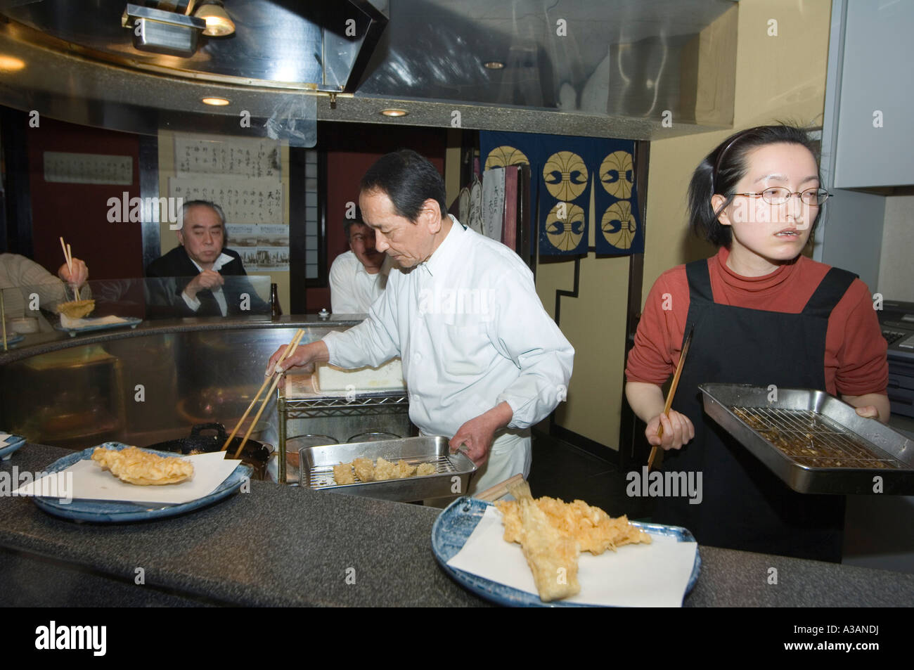 chef cooking at tempura restaurant Japan Asia Stock Photo Alamy