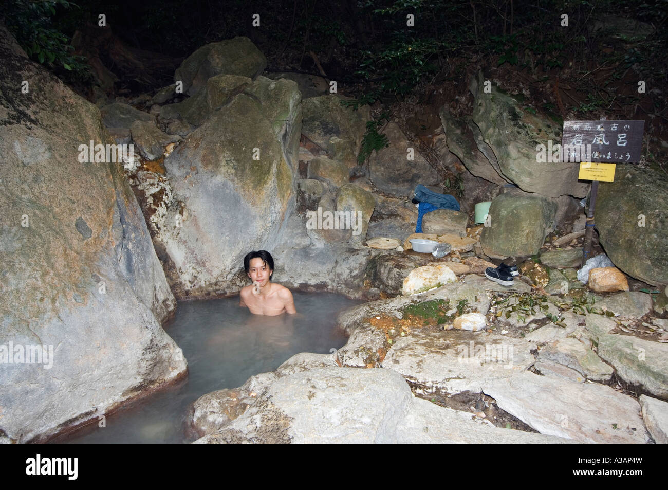 man bathing in iwaburo natural hotspring onsen Kirishima National Park Kagoshima prefecture Kyushu Japan Asia Stock Photo