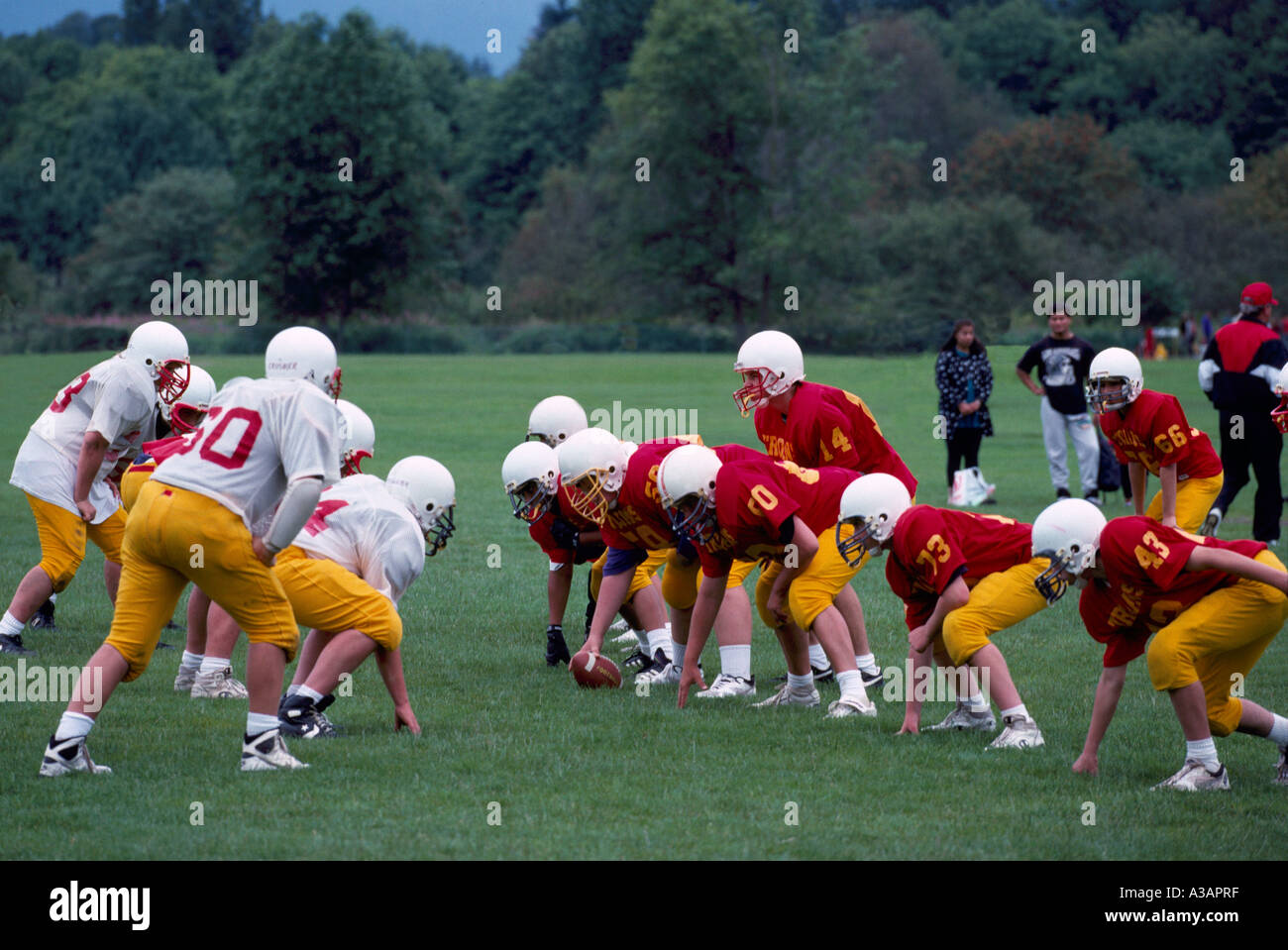 Youth Football Teams playing at the Burnaby Lake Sports Field in the City of Burnaby in British Columbia Canada Stock Photo