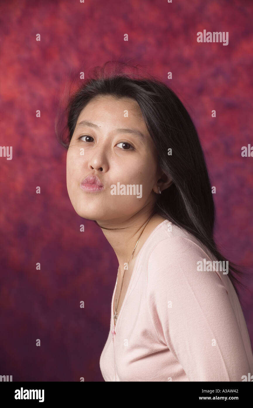 Studio Portrait of Young Asian Woman Stock Photo - Alamy