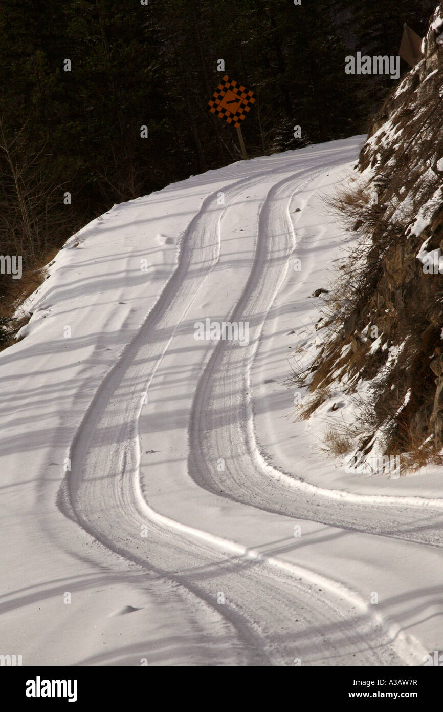 narrow Alberta logging road in winter Stock Photo