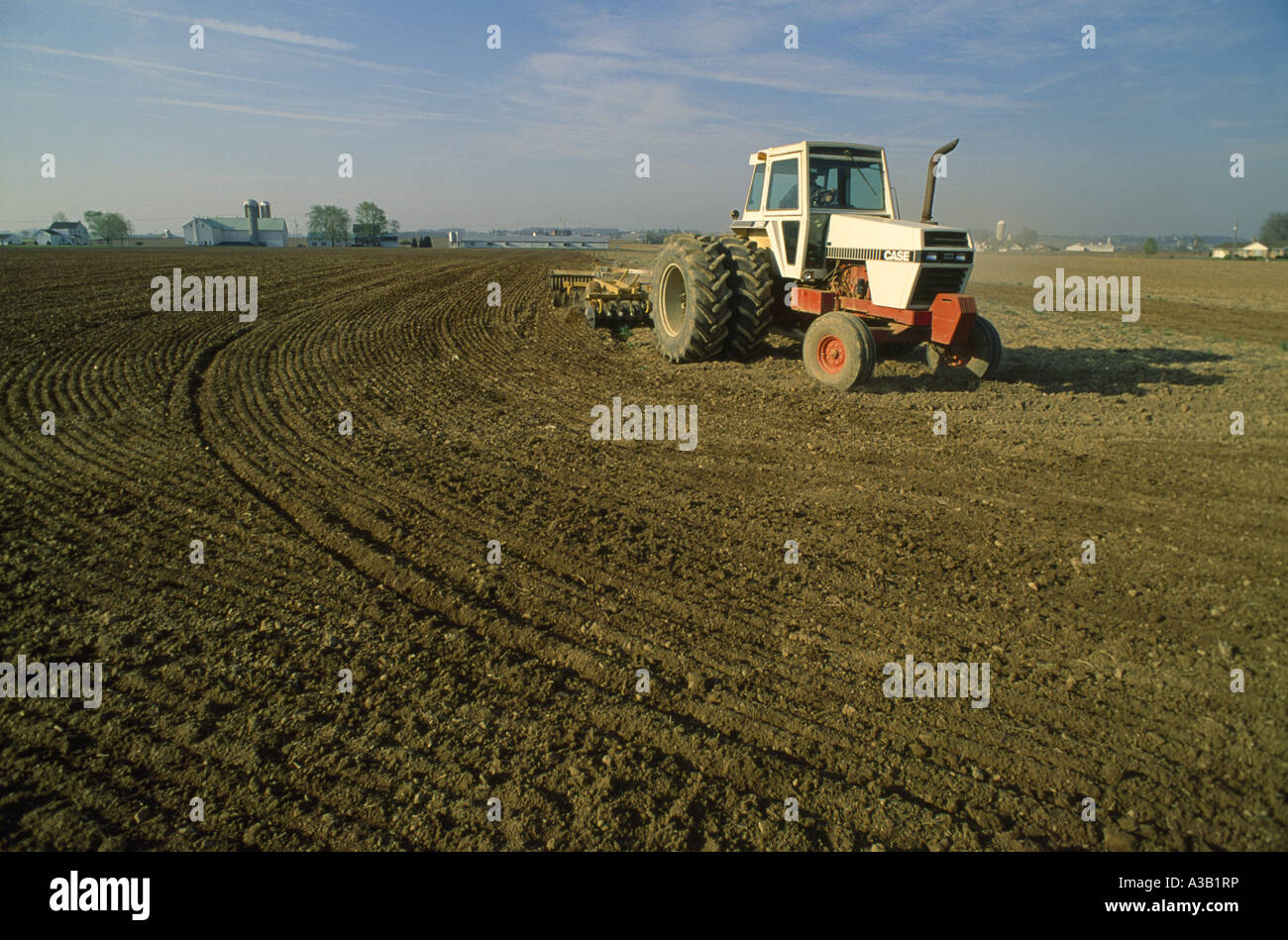 TRACTOR DISKING FIELD Stock Photo Alamy