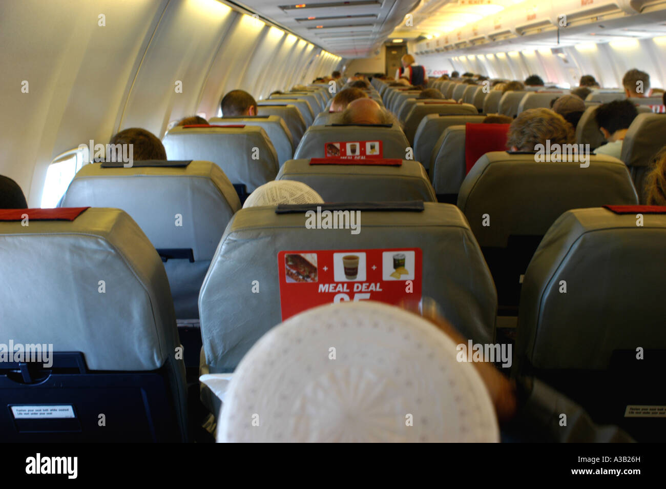 Budget airline travel The view from the back of a 747 passenger aeroplane cabin Stock Photo