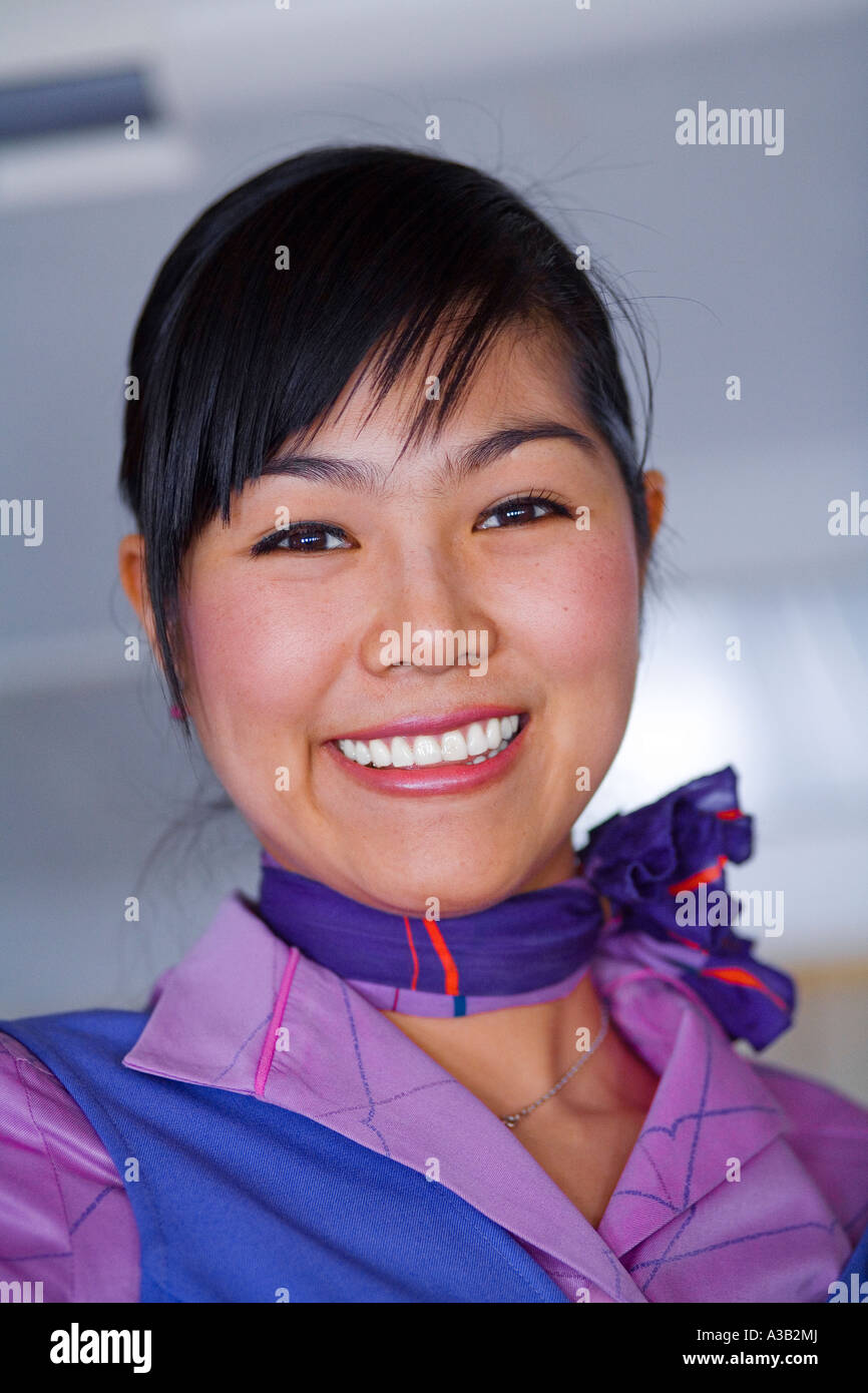 Portrait of Thai Airlines female flight attendant Stock Photo