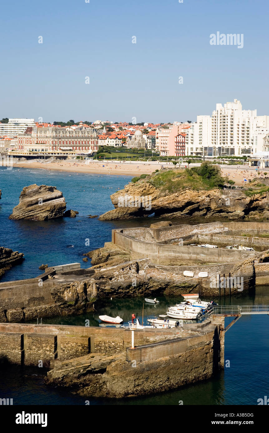 FRANCE Aquitaine Pyrenees Atlantique Biarritz Port des Pecheurs Fishing boat harbour with view to Grande Plage beach and hotels. Stock Photo