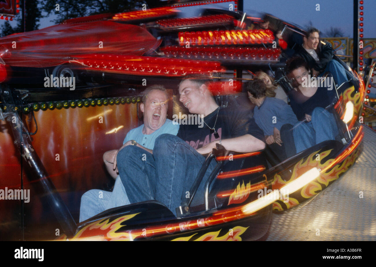 Funfair ride people hi-res stock photography and images - Alamy