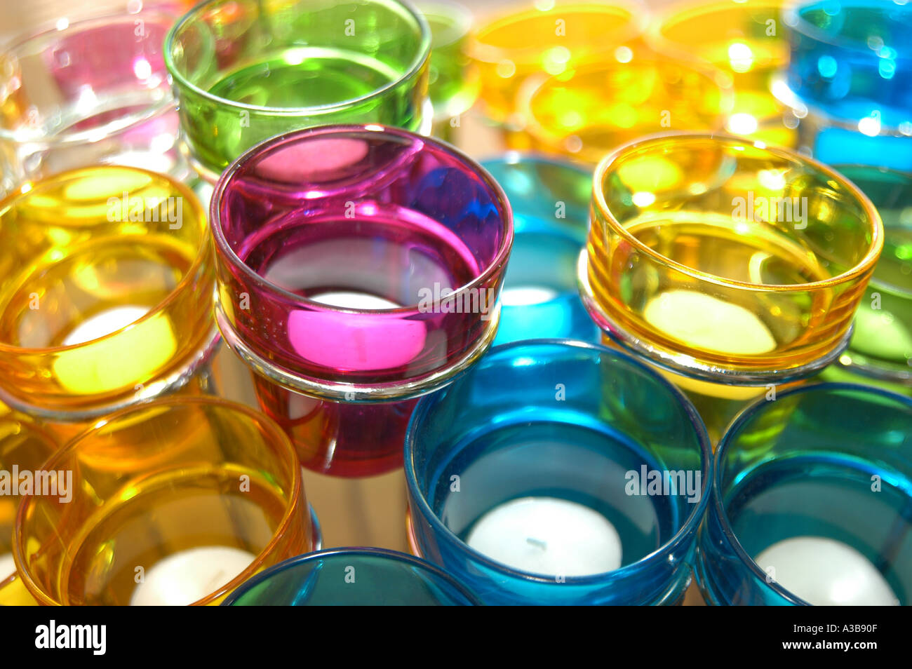 Coloured, glass night-lights in shop display, Tunbridge Wells, Kent. Stock Photo