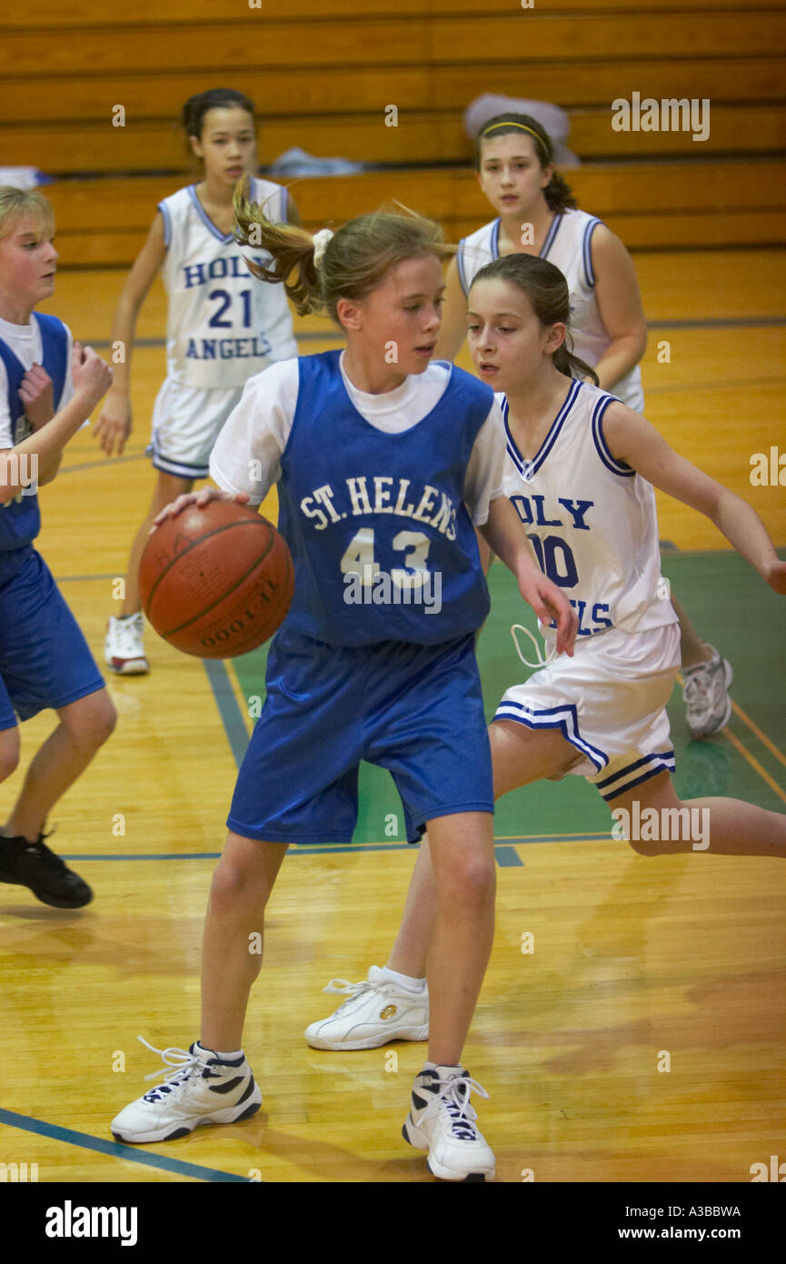 Middle school girl basketball team hires stock photography and images