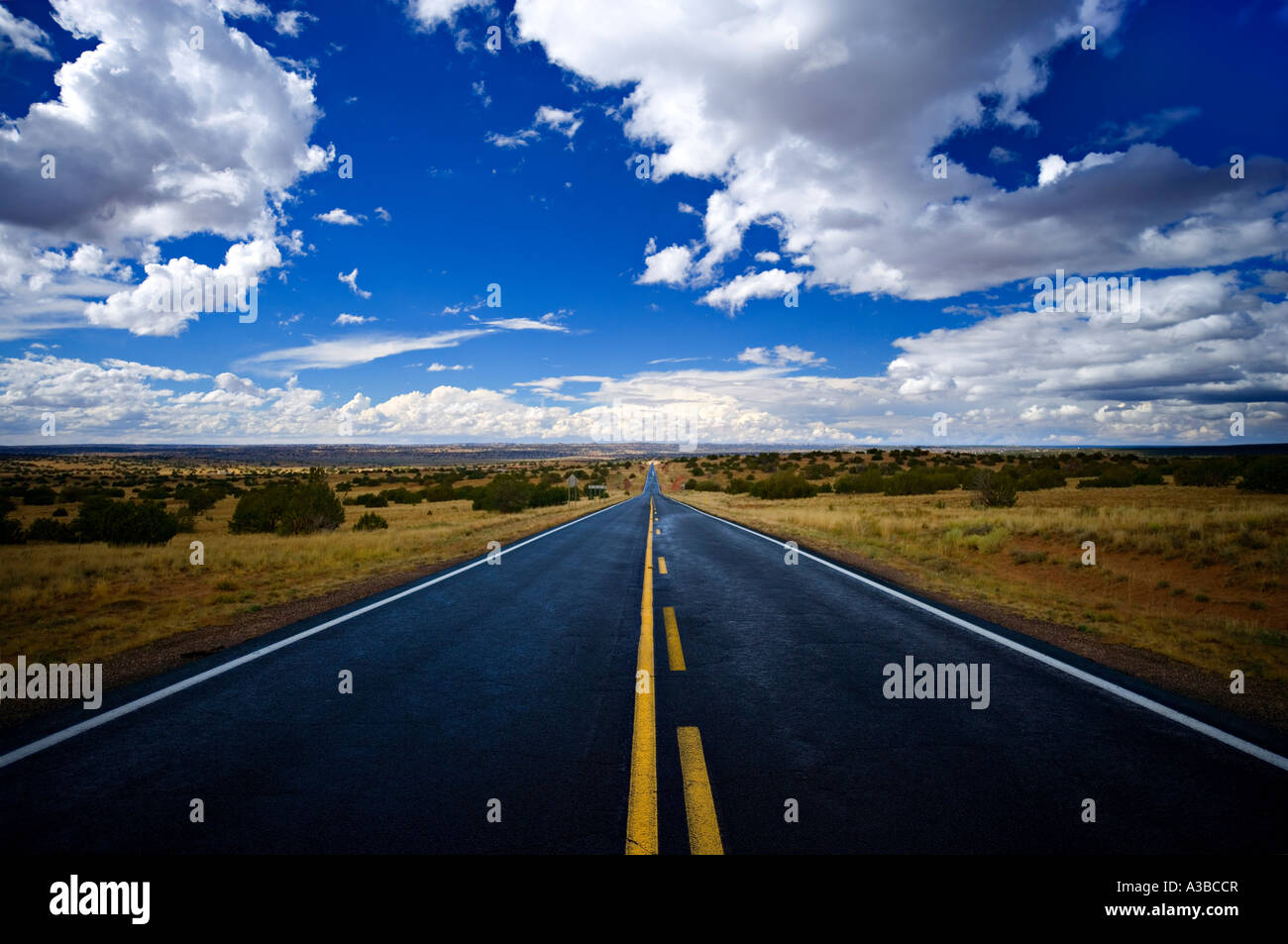 Open Road with Blue Sky and clouds Stock Photo - Alamy