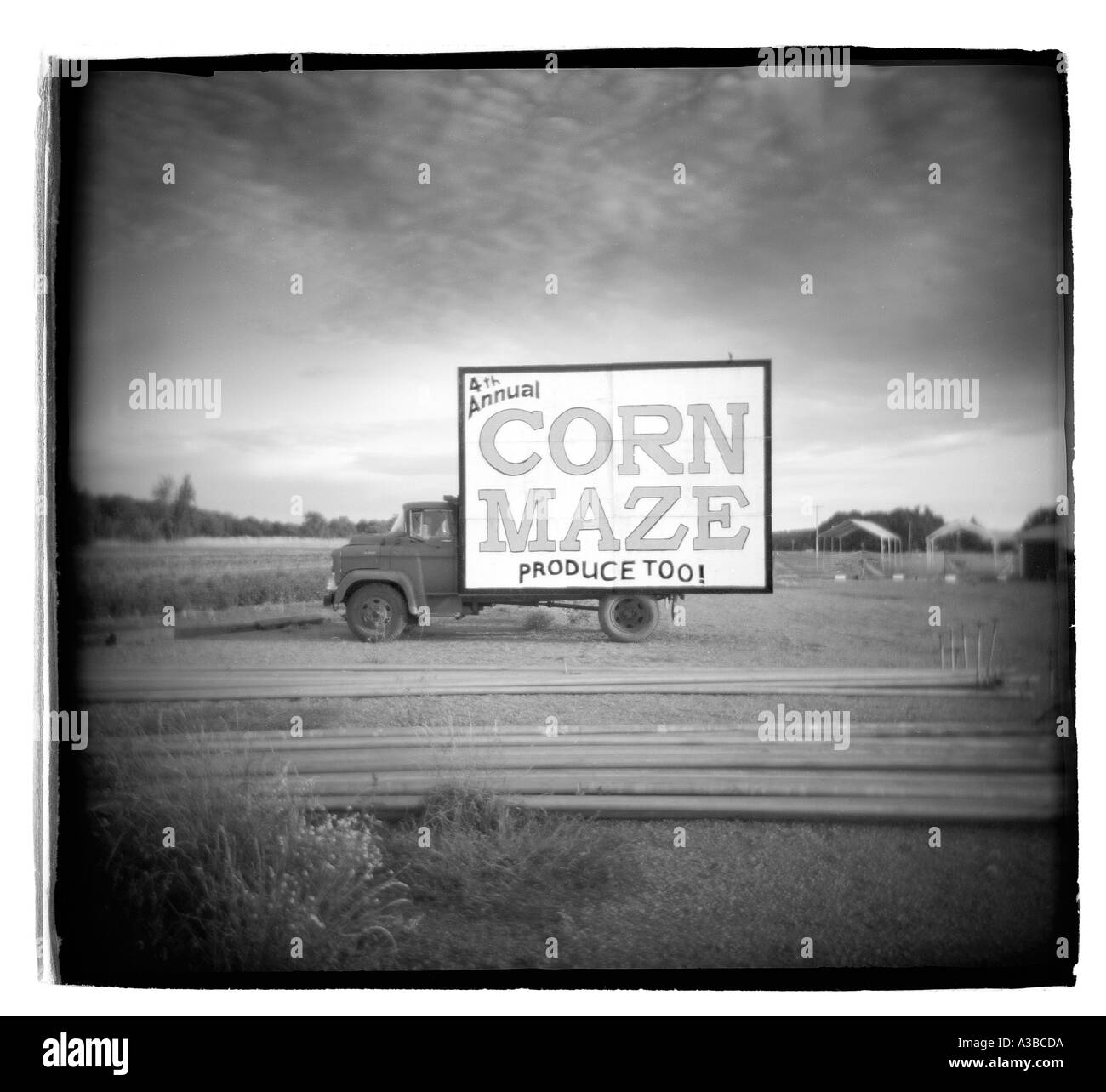 old truck with corn maze sign painted on side Stock Photo