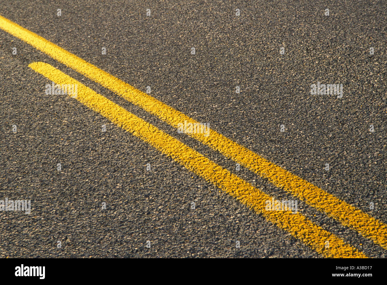 Highway with yellow striping to indicate no passing or crossing into