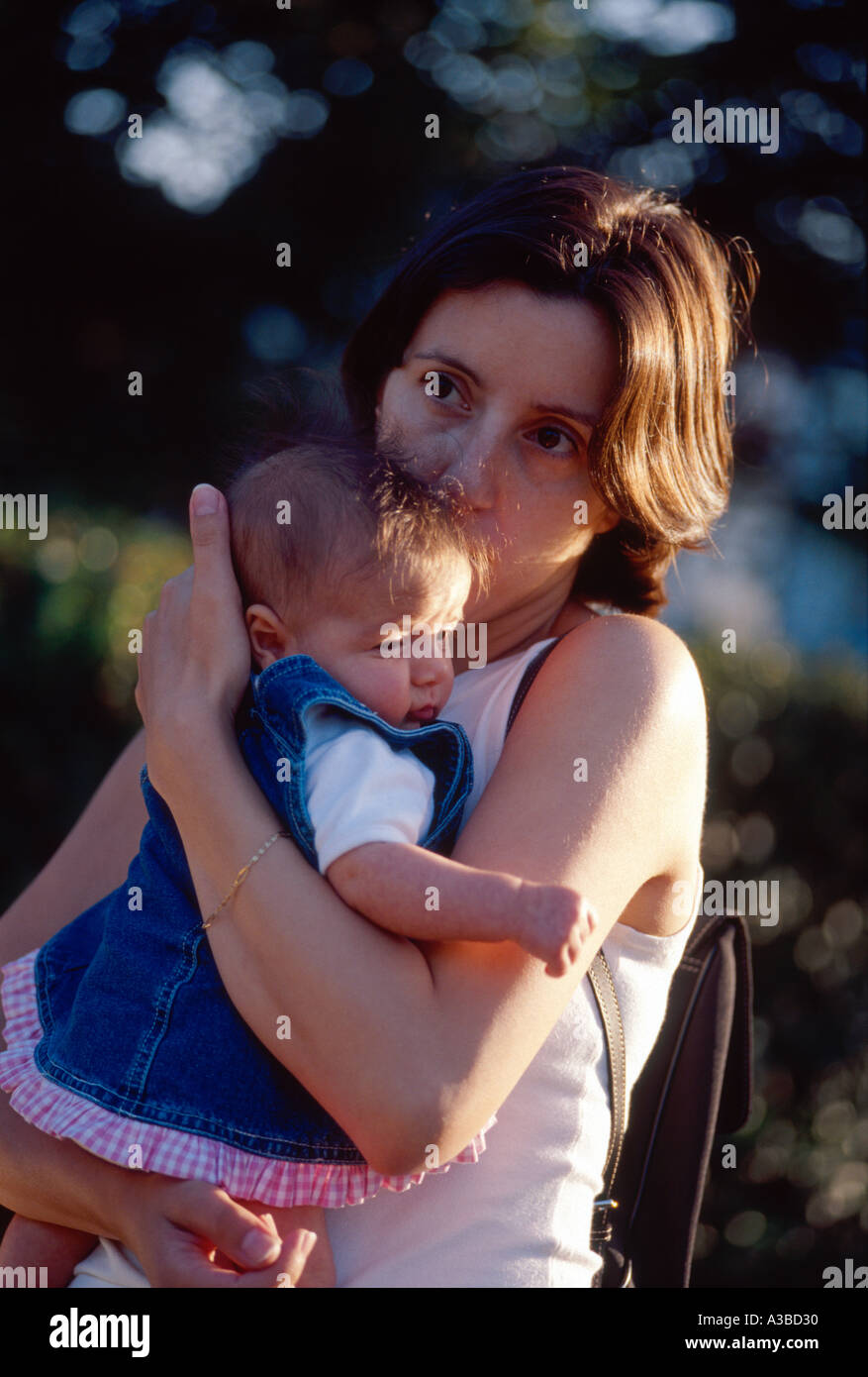 Mother holding a 2 months old baby Stock Photo Alamy