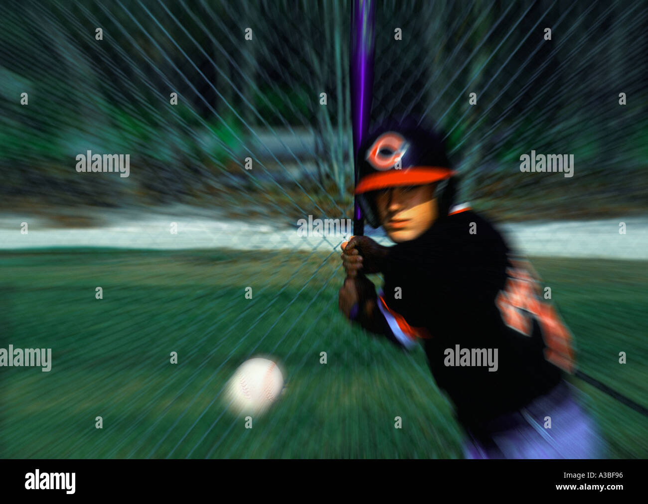 Action Baseball player hitting the ball Stock Photo Alamy