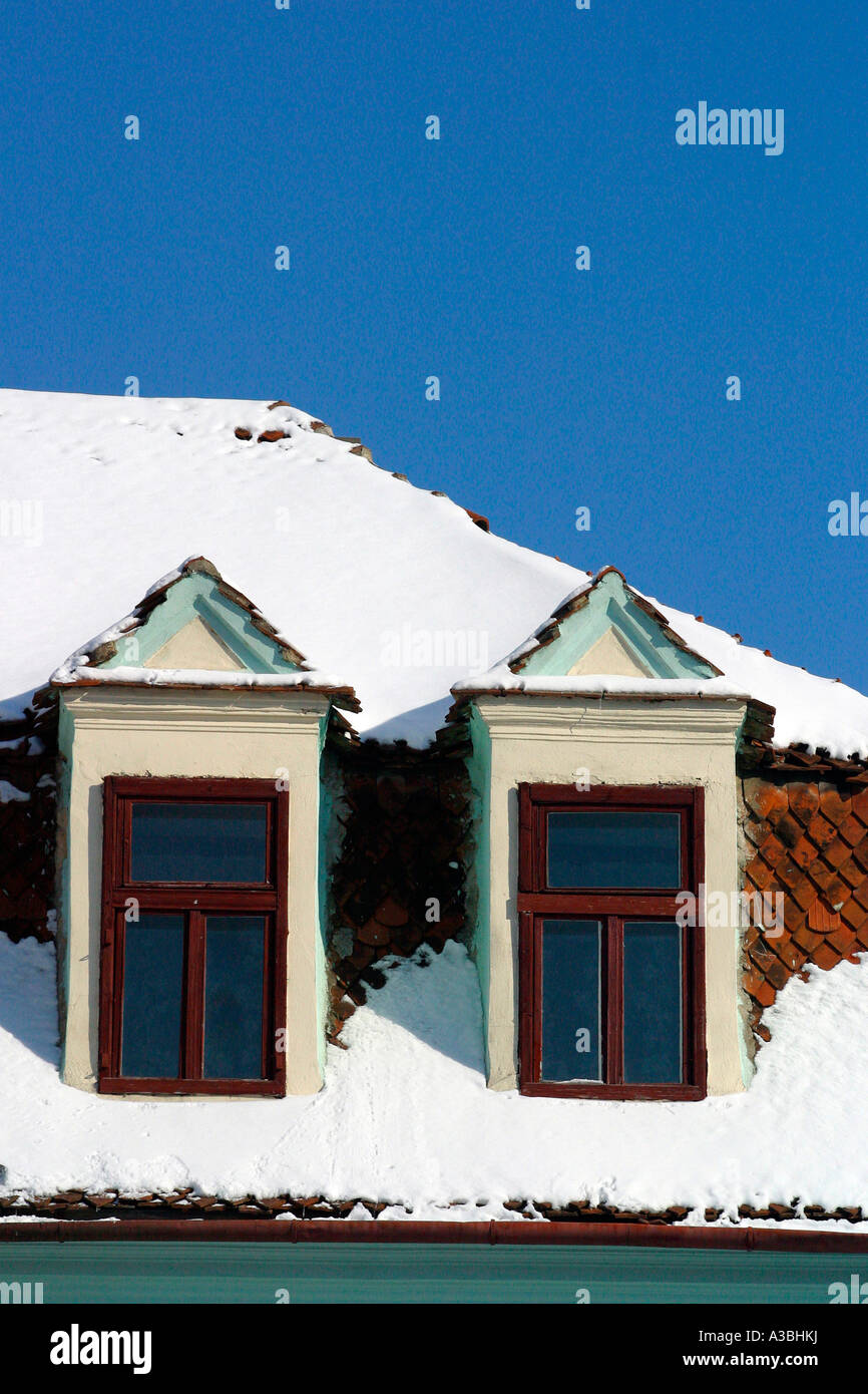 rooftop window and snow Stock Photo - Alamy
