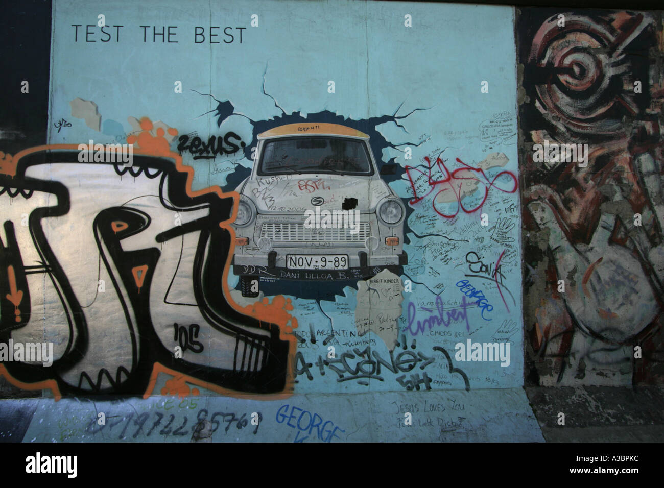 Graffiti on the wall representing the TRABI, the symbol of the comunism, Berlin, Germany Stock Photo