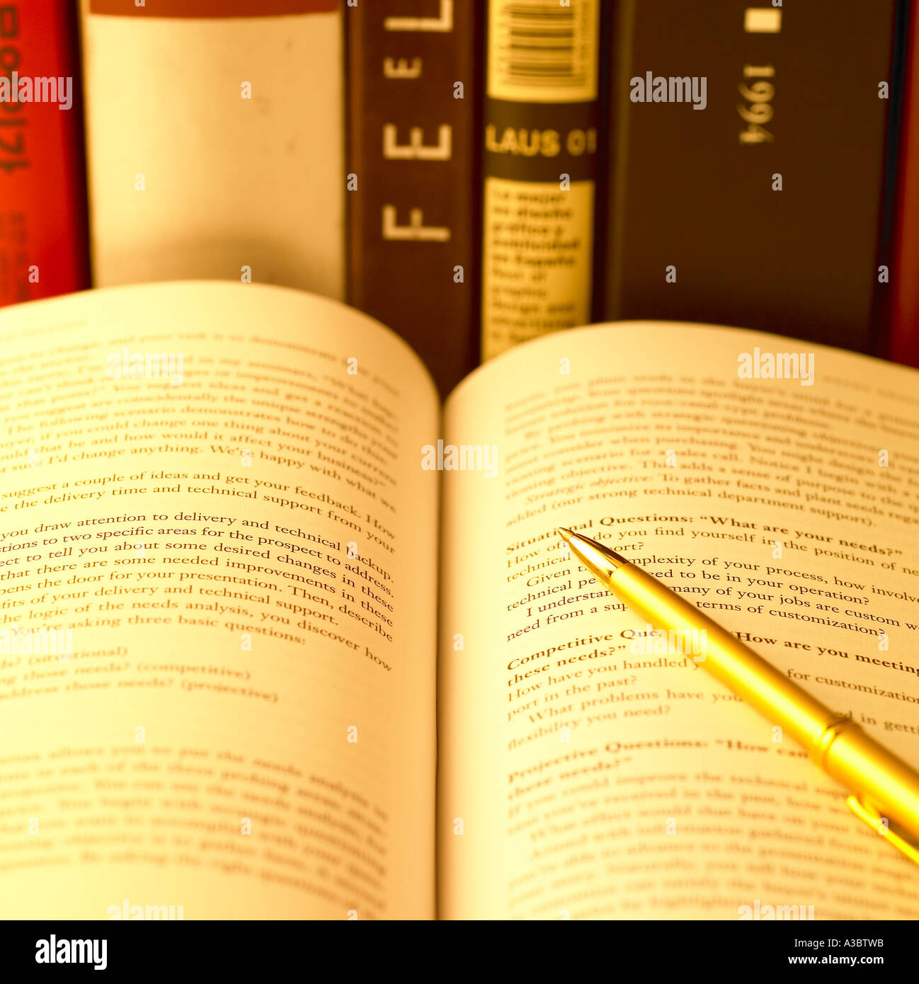 An Open Book And A Pen Stock Photo - Alamy