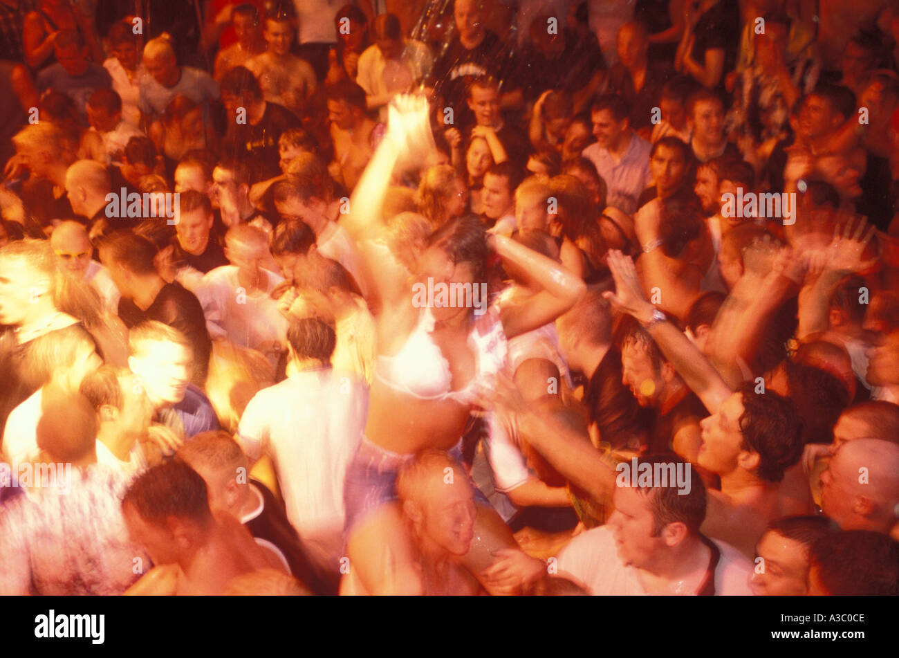 Clubbers at Water Party at Es Paradis nightclub in San Antonio, Ibiza Spain Stock Photo