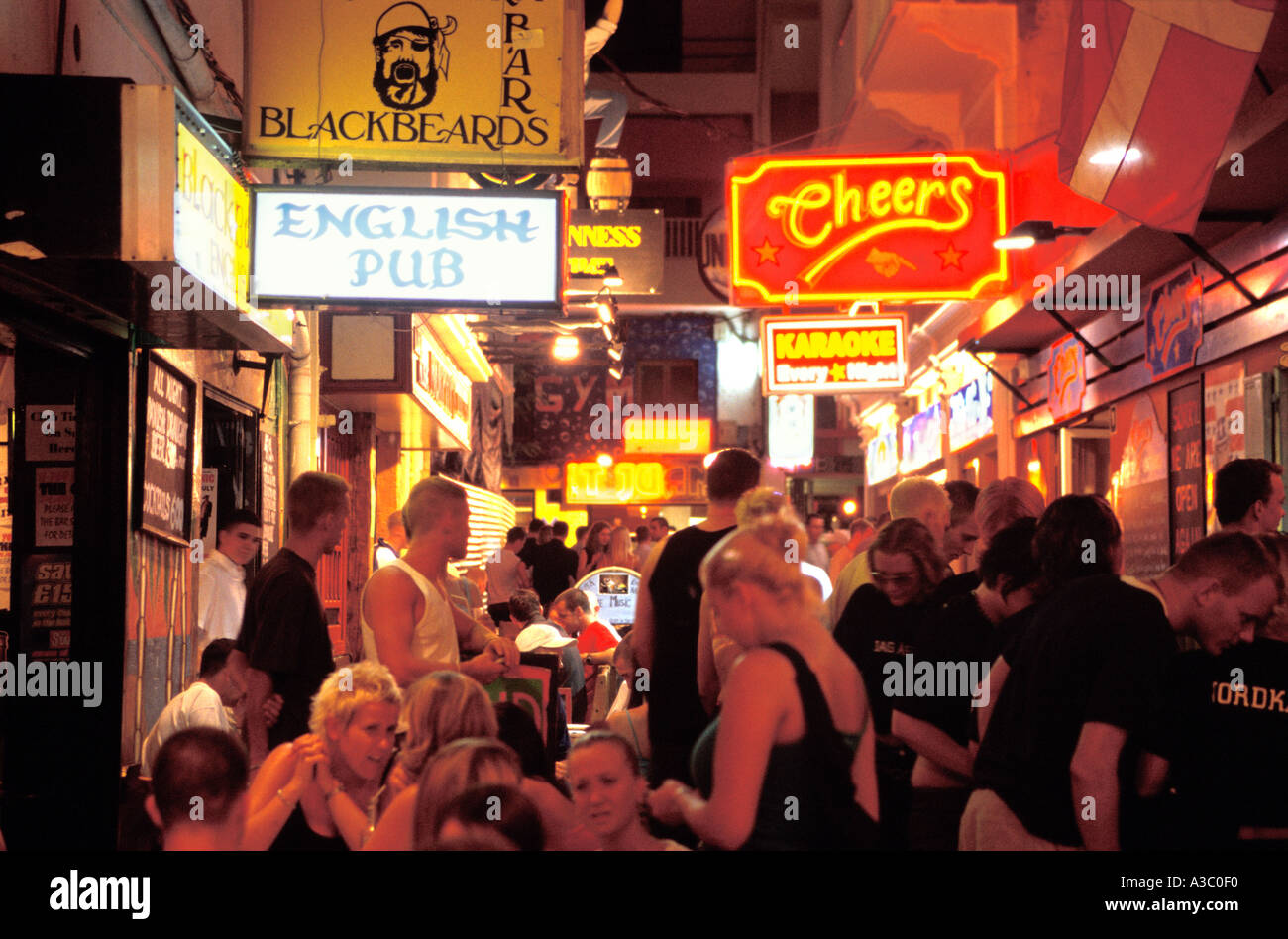 Holidaymakers on night out in San Antonio, Ibiza, Spain Stock Photo