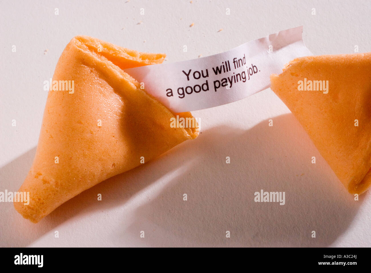 An opened fortune cookie with the message reading You will find a good