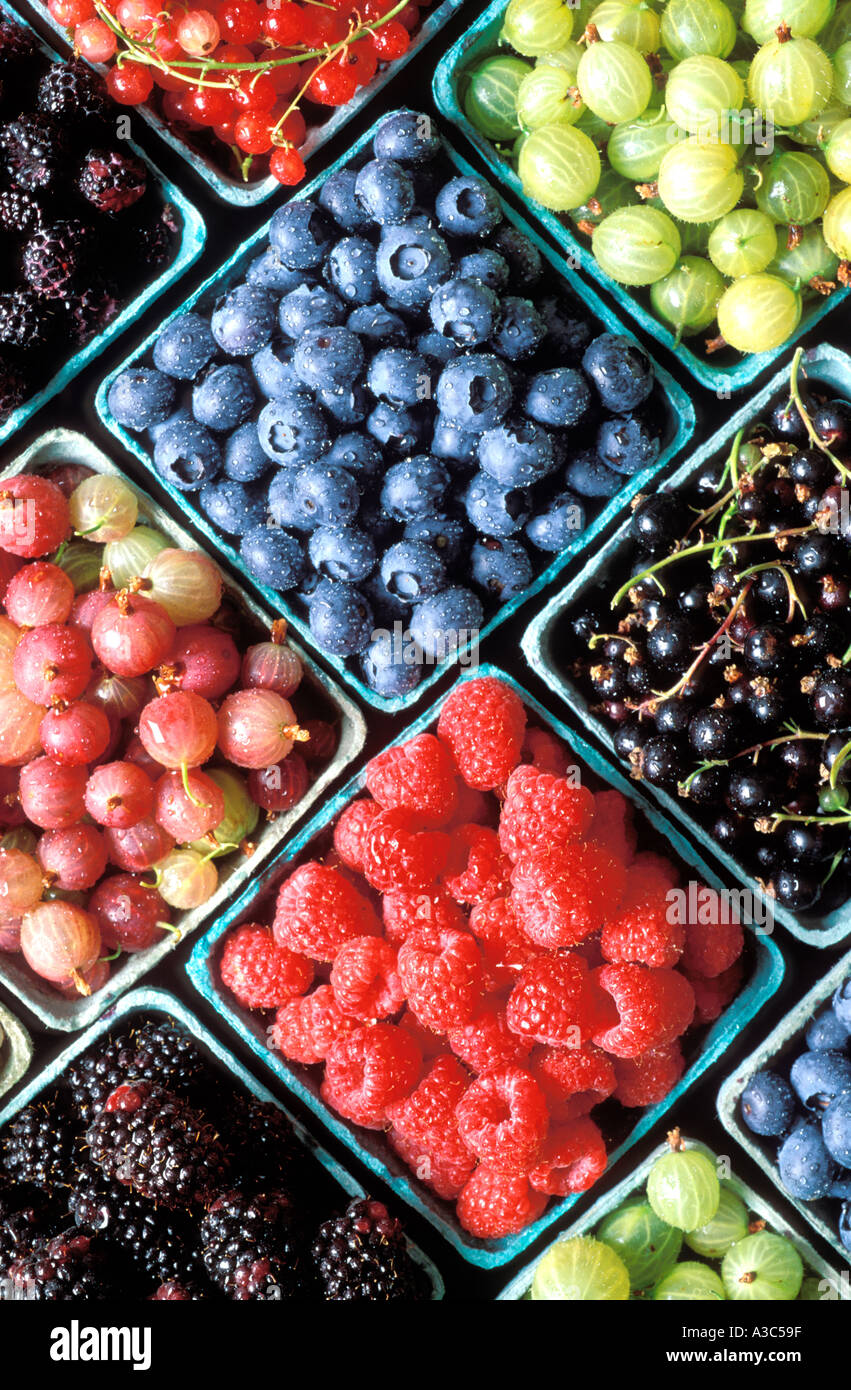 Several varieties of berries in baskets Stock Photo