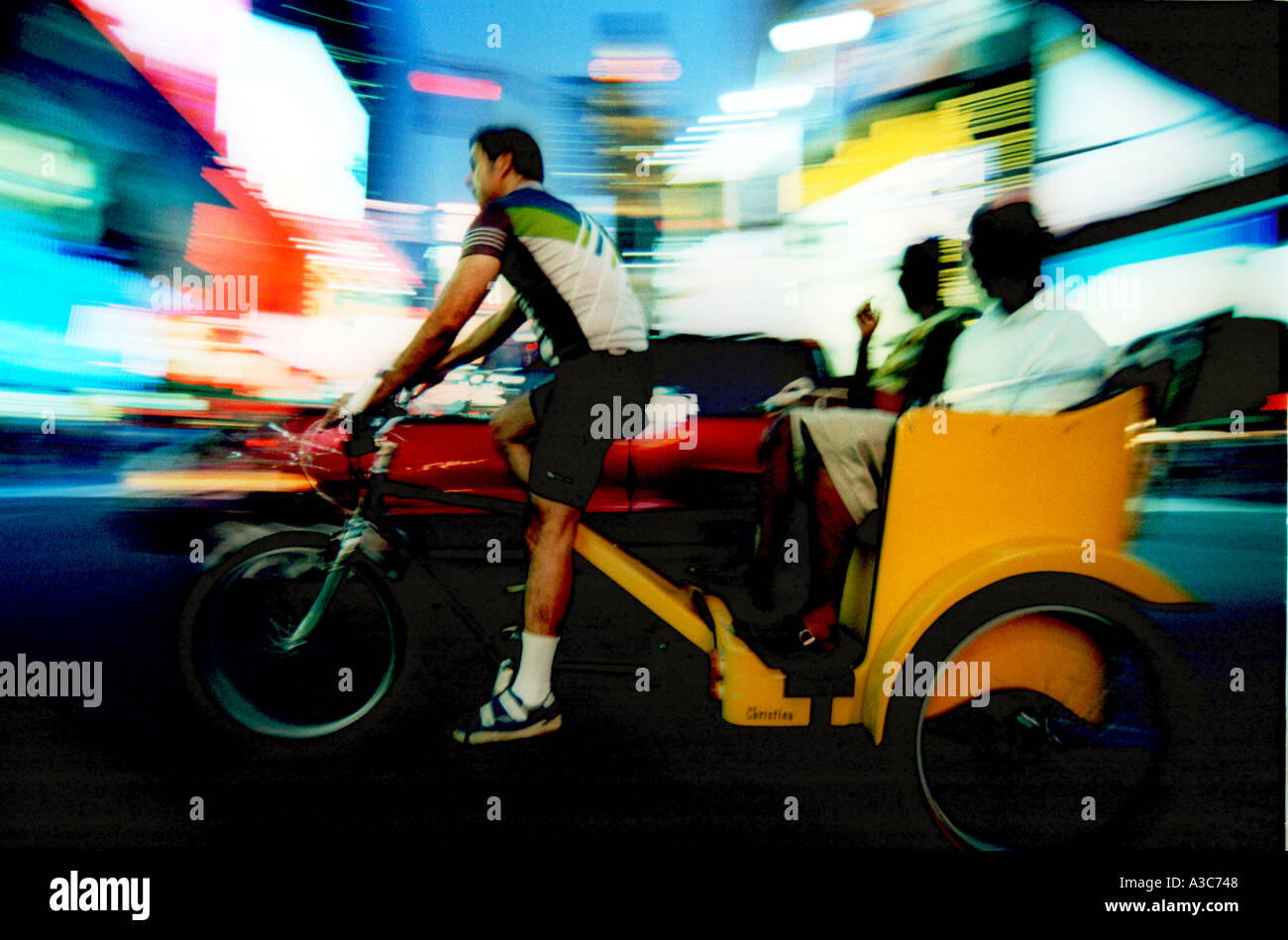 Bicycle riksha with tourists in Times Square in Manhatten New York City ...