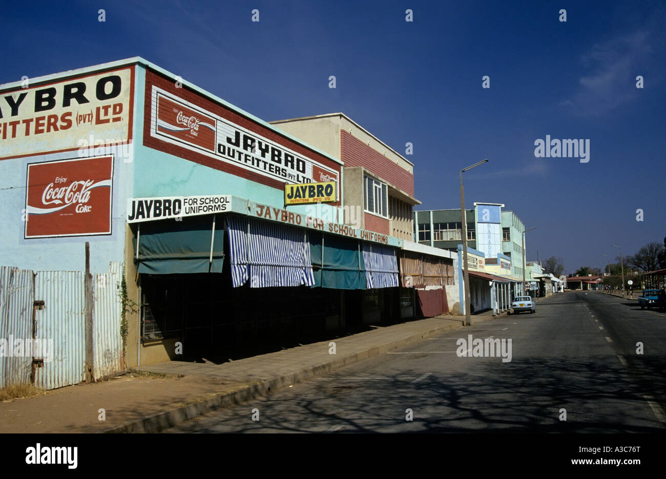 Street of shops including an outfitter for school uniforms Gweru