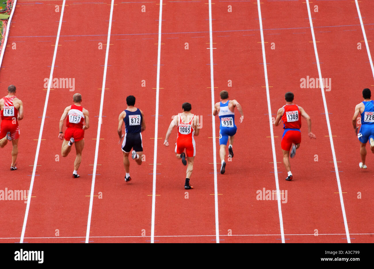 runners running a 100m race track and field th Stock Photo Alamy
