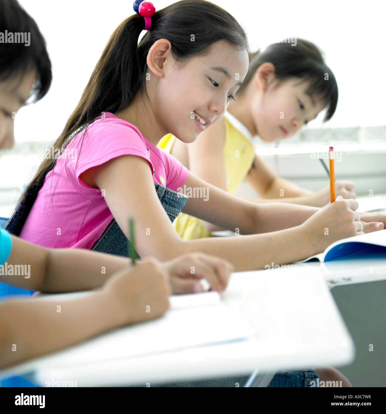 Children studying in the classroom Stock Photo - Alamy
