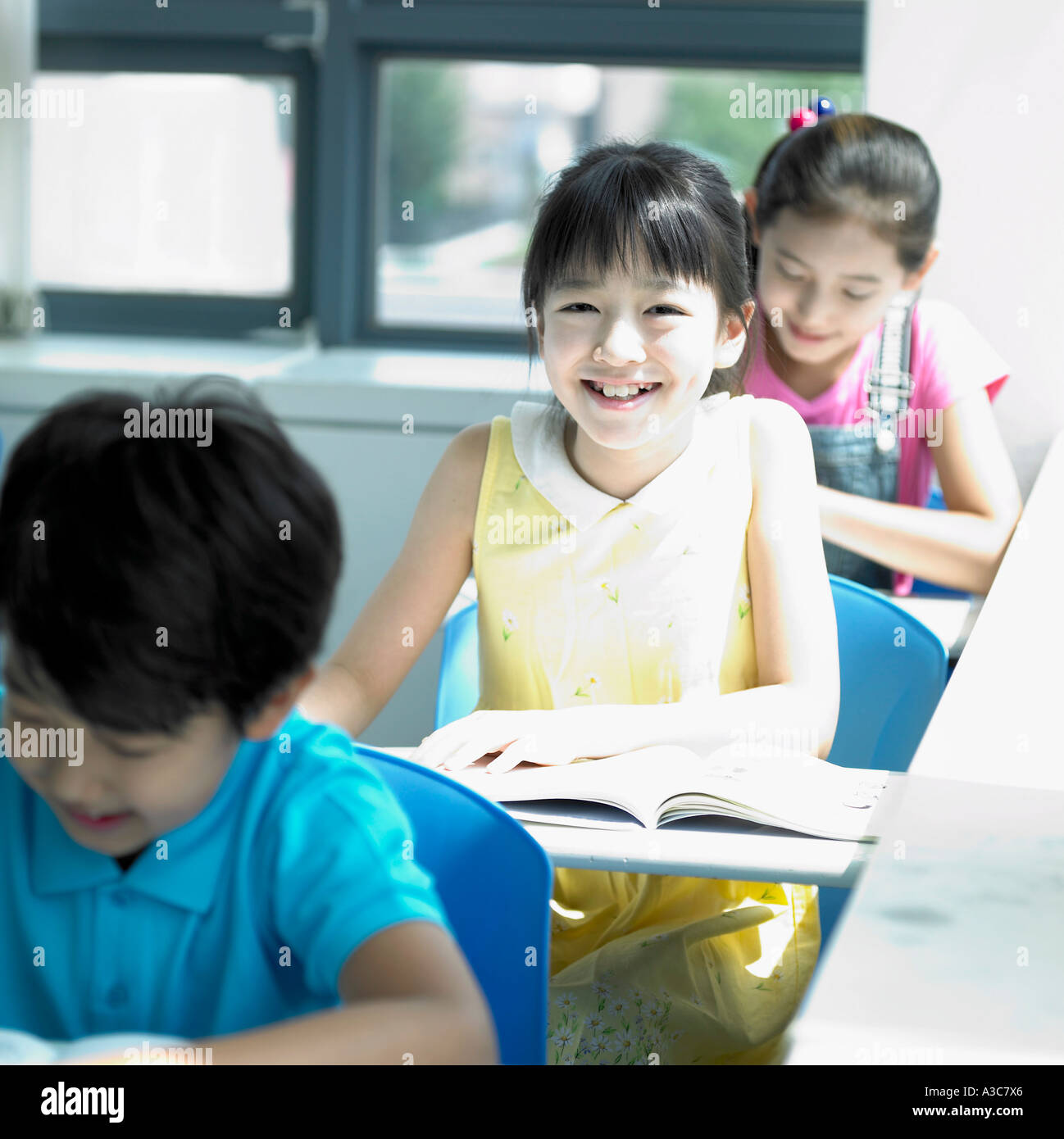Children studying in the classroom Stock Photo - Alamy