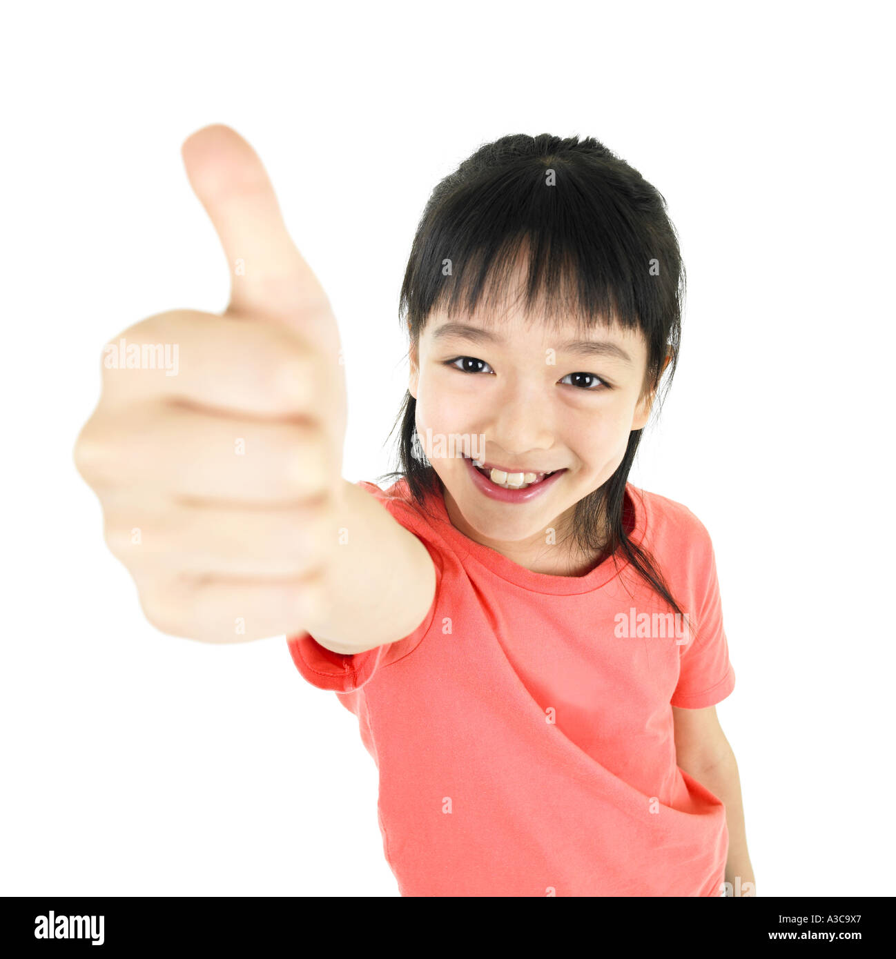 Girl with thumbs up Stock Photo - Alamy