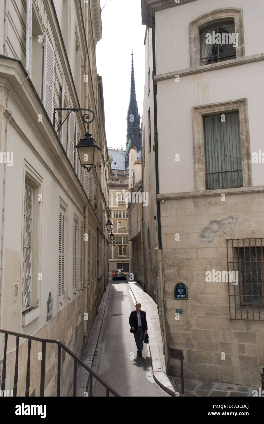 View down a side street in Paris France showing one of the spiars of the Notre Dame de paris