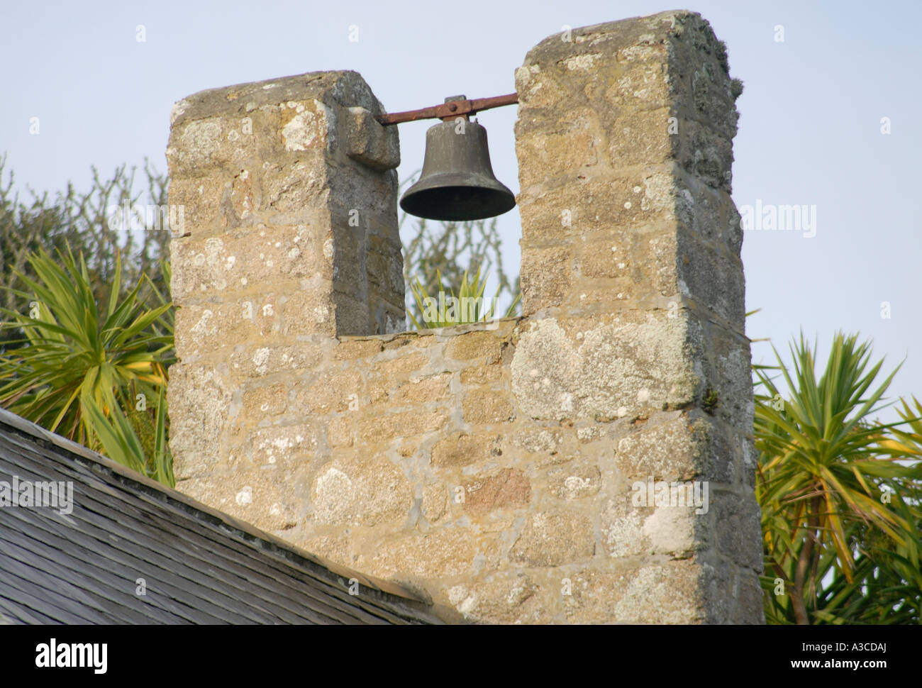 The simple stone bell tower and church bell of St Mary Old Church Stock Photo