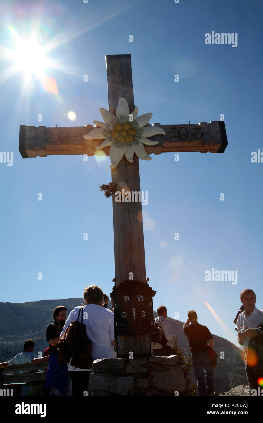 Upper Bavarian Alps with cross and people and hikers and Obersalzberg Mountian near Berchtesgaden Germany Stock Photo