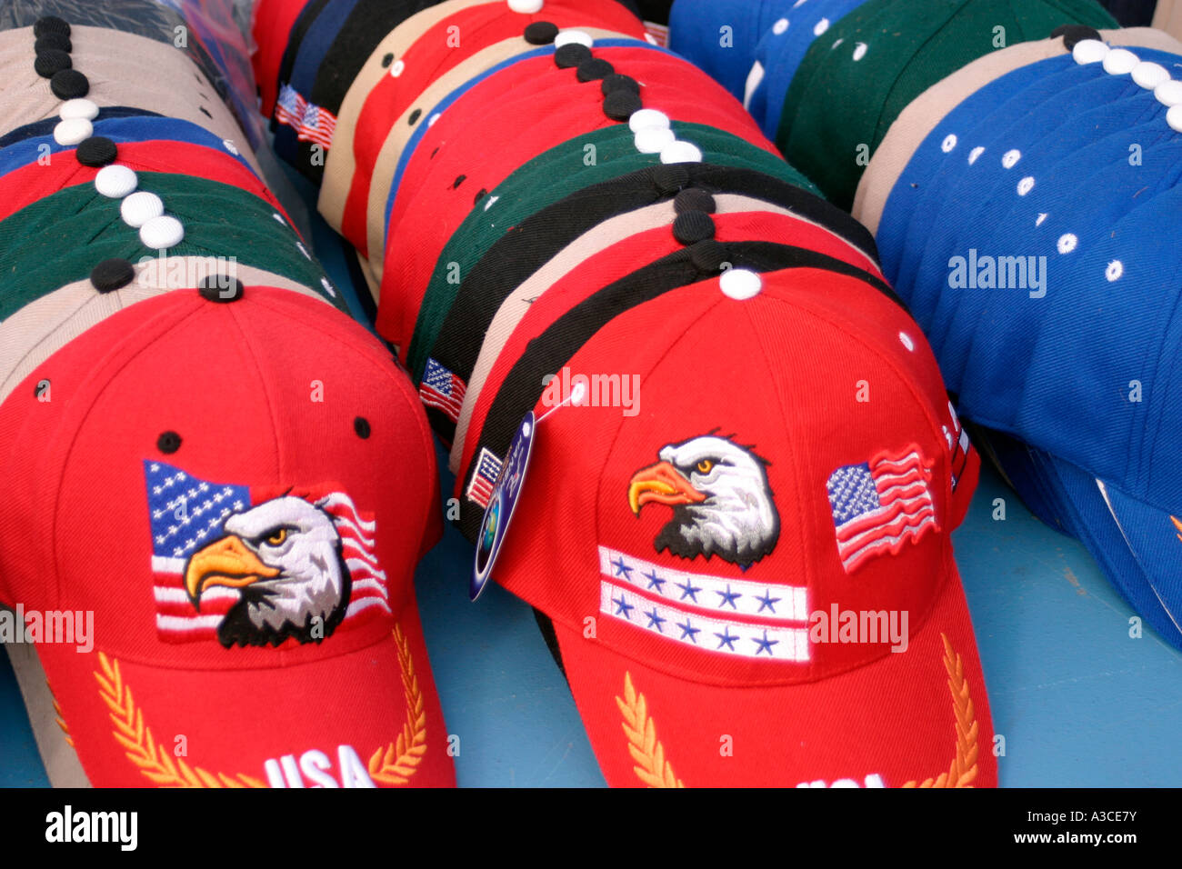 Assortment of Colorful Display of Baseball Caps at flea market in