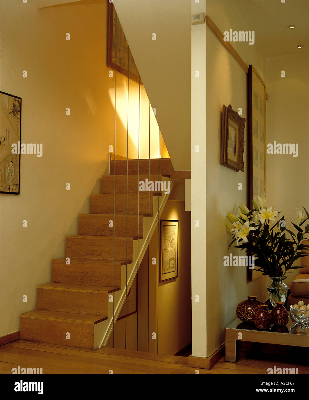 Modern Wooden Staircase With Fine Metal Floor To Ceiling Banister Stock Photo Alamy