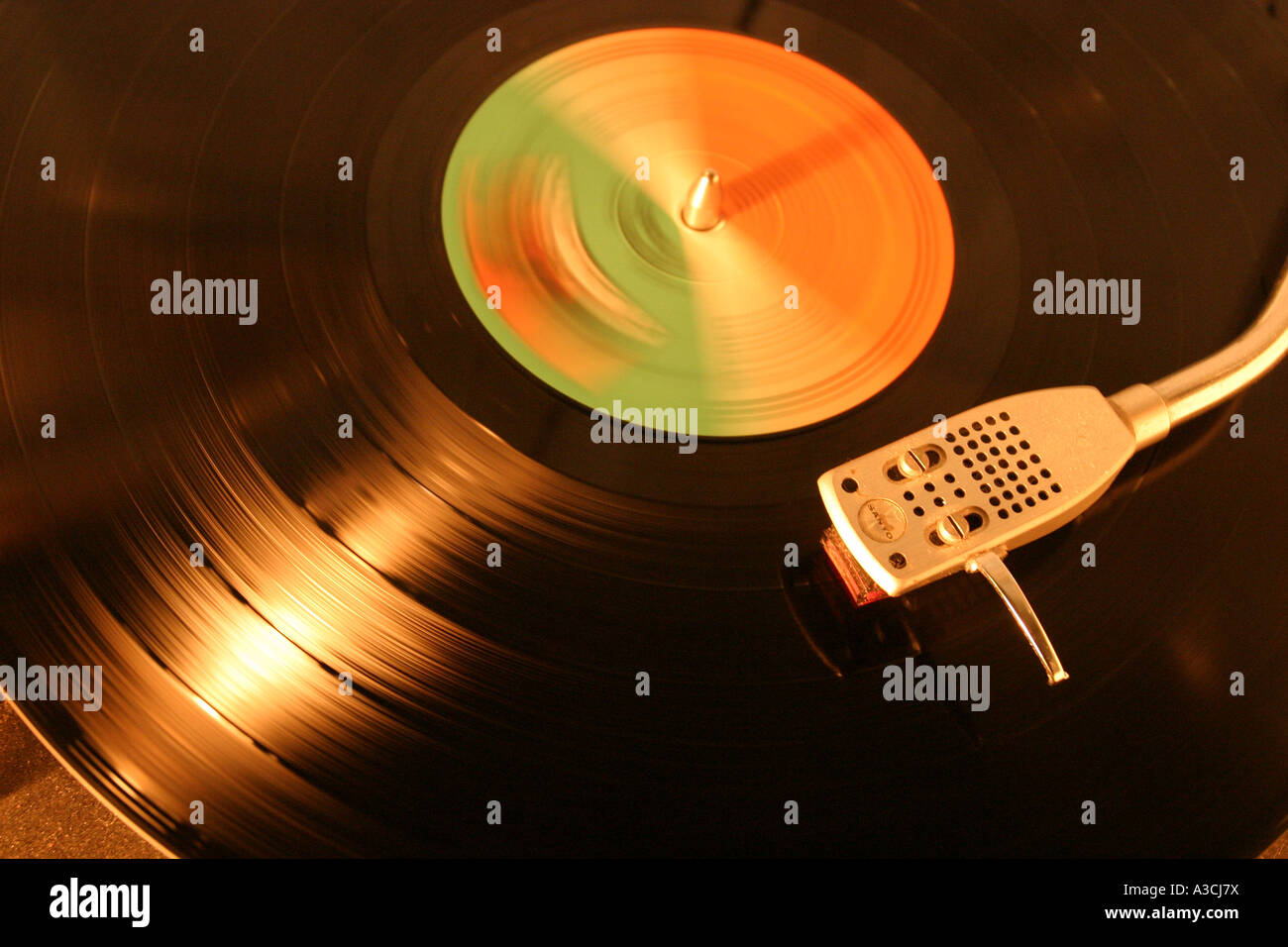 Vinyl record spinning with stylus arm Stock Photo
