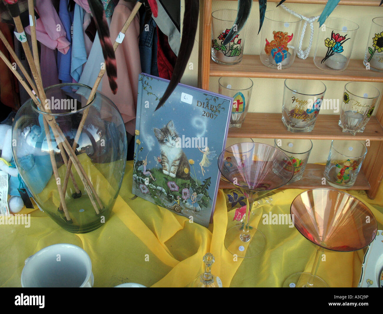 Charity shop window display Cornwall UK Stock Photo - Alamy