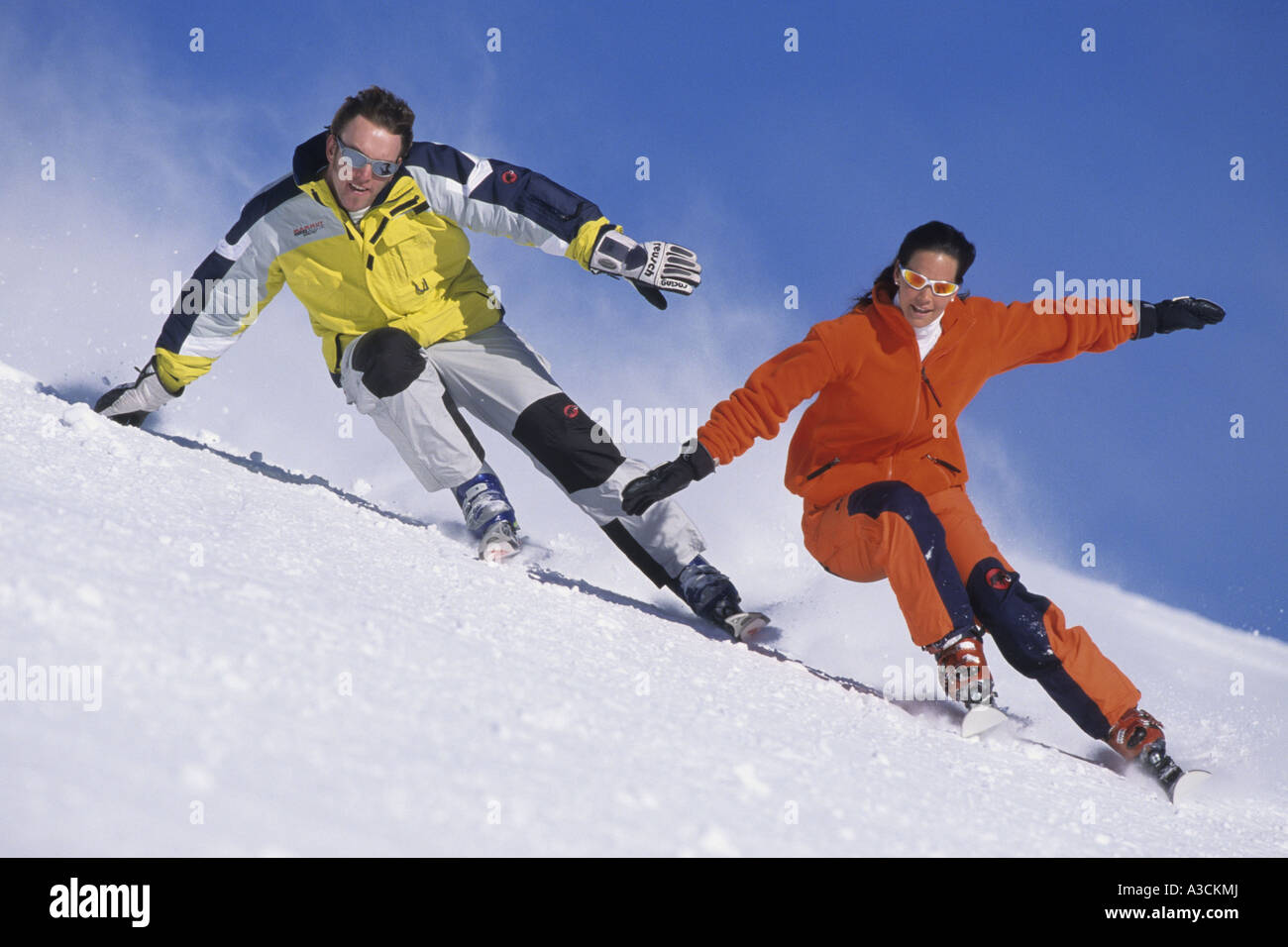 two skier racing downhill, Austria, Alps Stock Photo - Alamy
