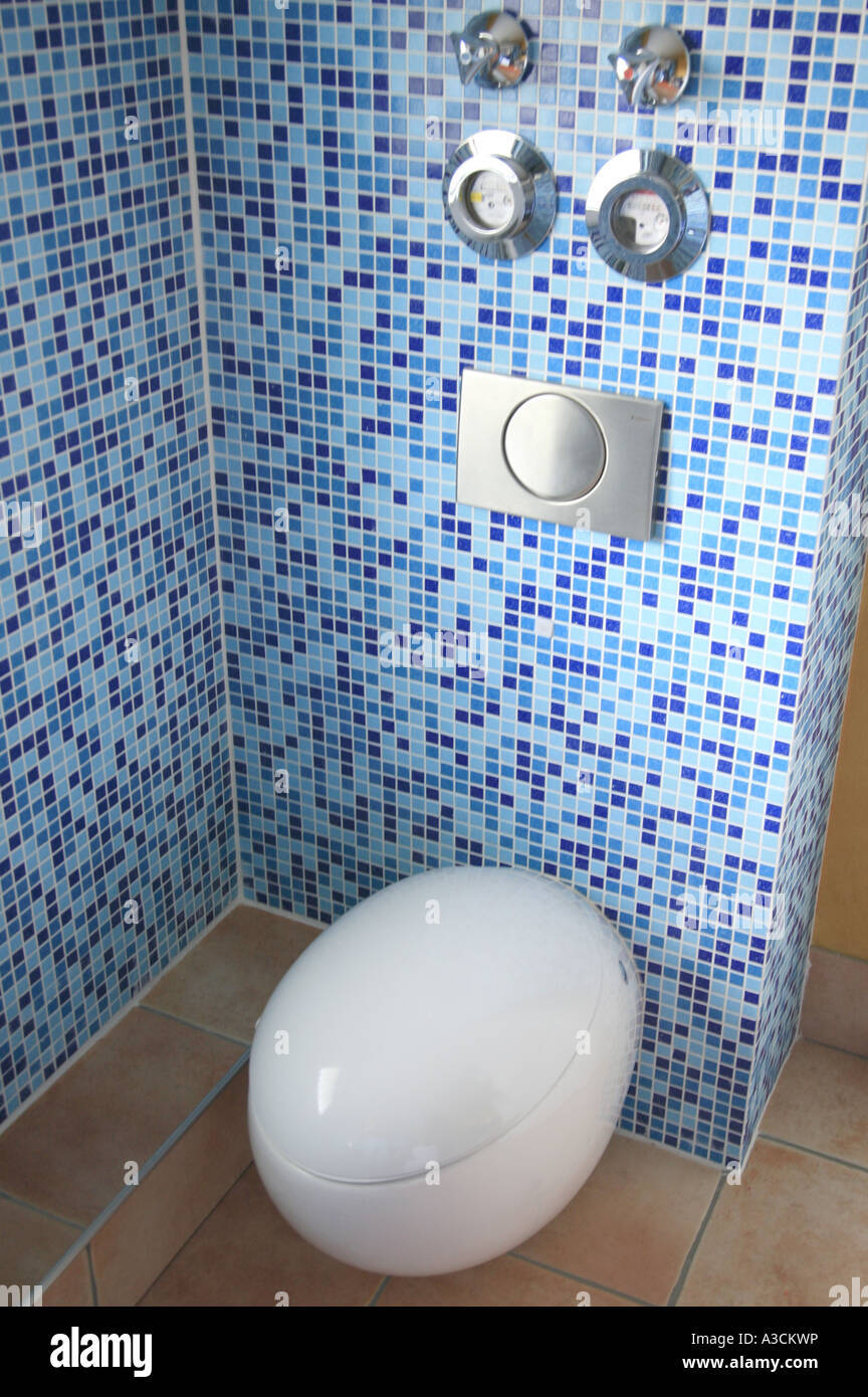 toiletseat with paper and flush Stock Photo Alamy