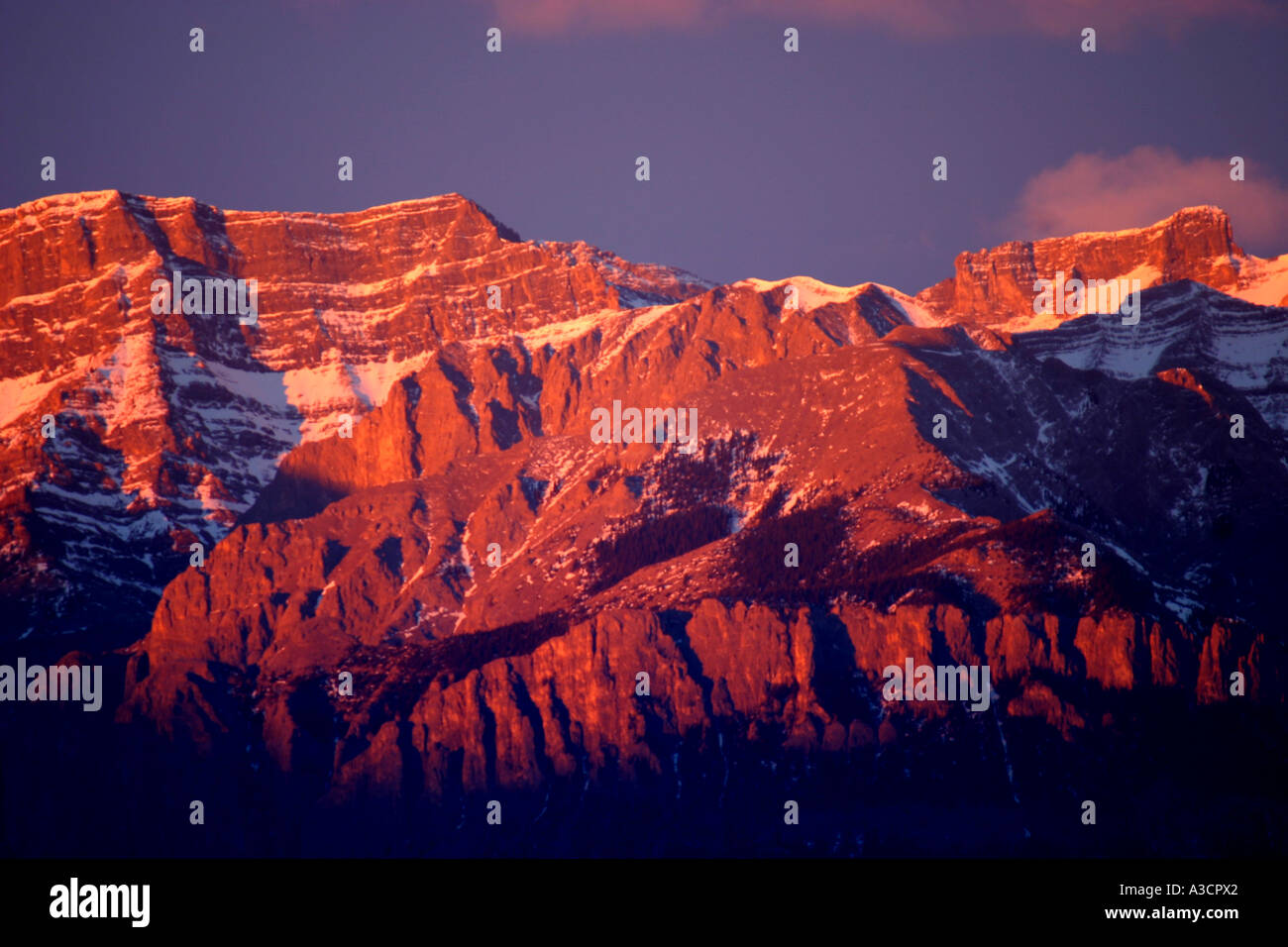 Mountain sunrise; Dawn in the Rockies Fire on the mountians Stock Photo