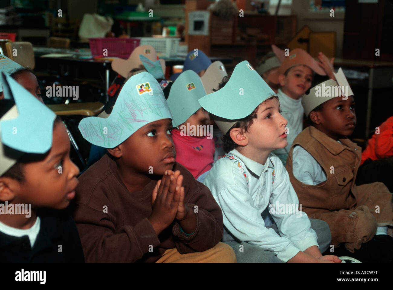 Kindergarten children in a Brooklyn, New York public school learn about the traditional view of the founding of America. Stock Photo