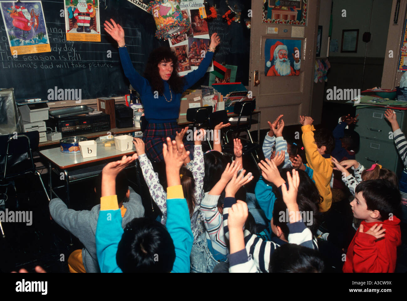 Children stretching in kindergarten class in New York City Stock Photo
