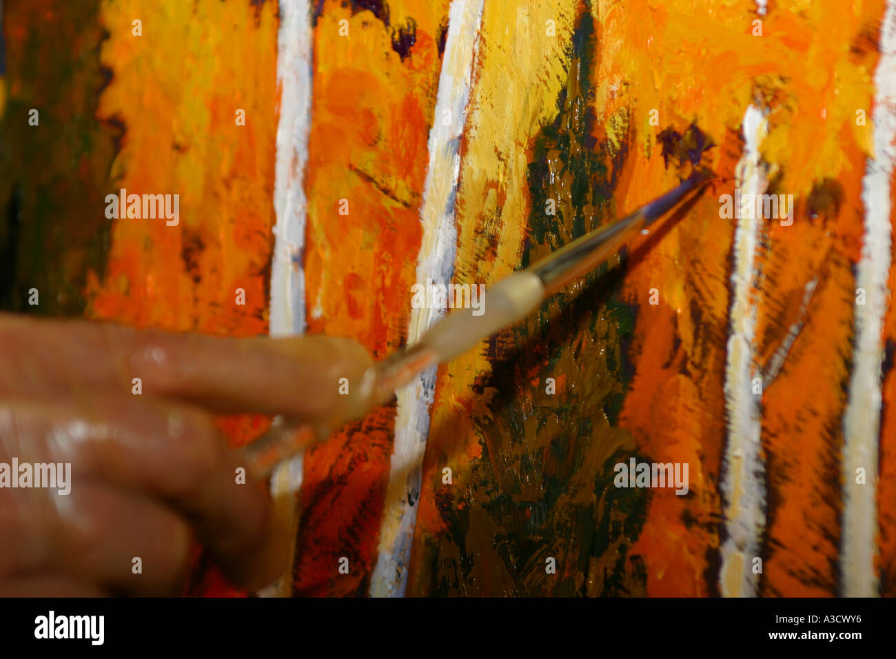 Artist at work doing an oil painting Stock Photo - Alamy