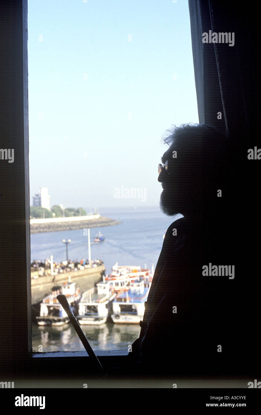 Maqbool Fida Husain, M. F. Hussain, Indian painter at Taj Mahal Hotel window, Bombay, Mumbai, India, Asia Stock Photo