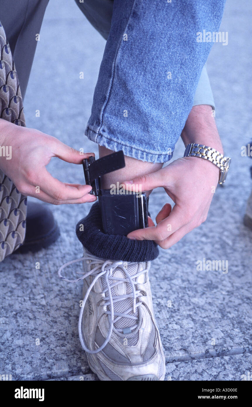 Electronic monitoring (ankle) device hires stock photography and
