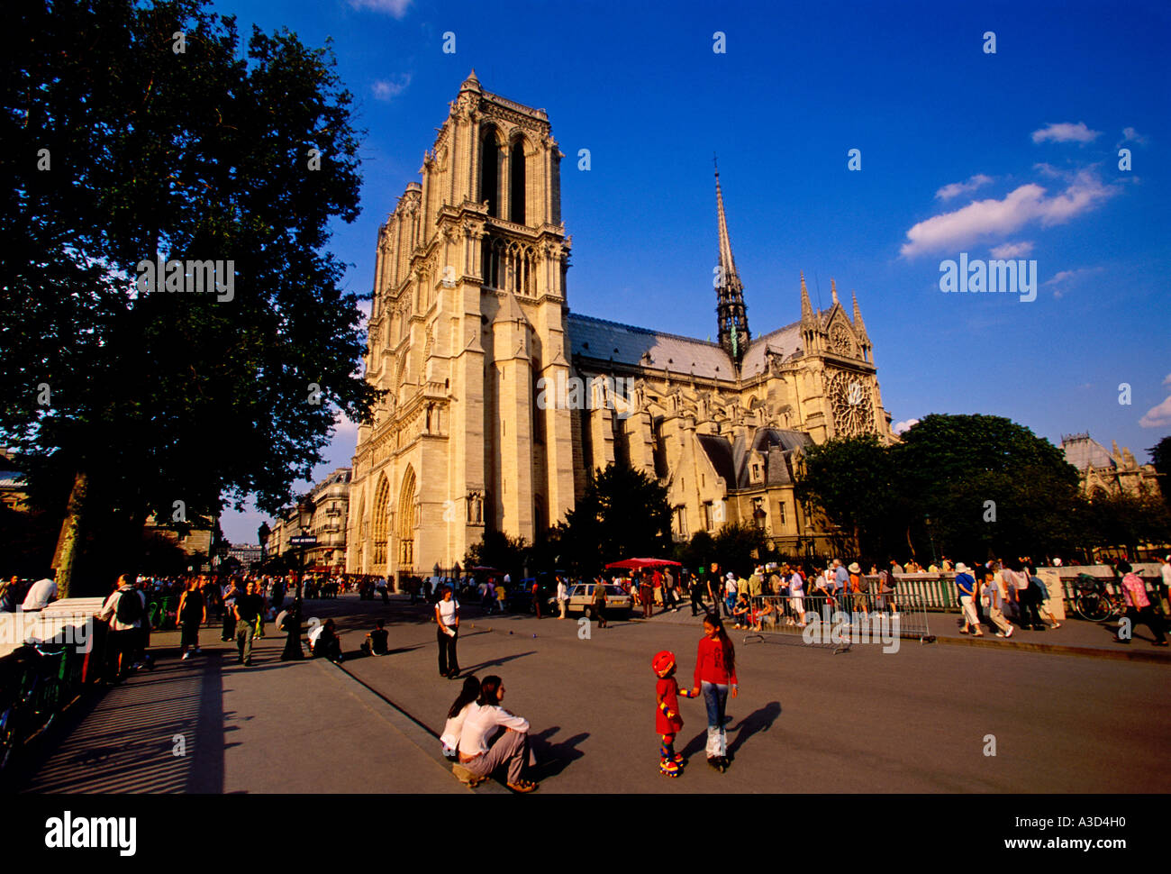 French children rollerblading near Notre-Dame Cathedral in Paris in Ile-de-France in France in Europe Stock Photo