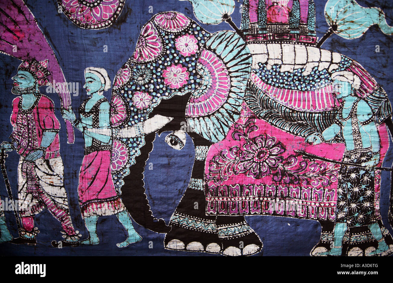 Close up macro detail of batik hand made in Kandy Sri Lanka , depicting elephant in costume, in beautiful blue and pink colour Stock Photo