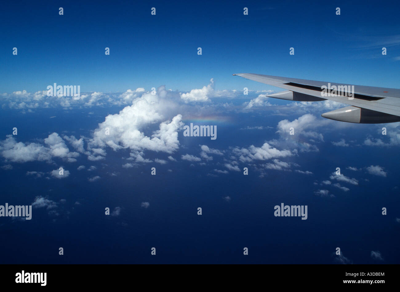 Airlines cruising above the clouds at 35000 feet over the Caribbean Stock Photo